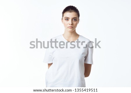 Beautiful woman well-groomed hair white T-shirt