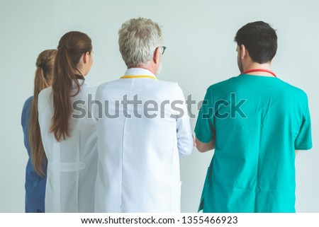 Group of happy doctor surgeon and nurse for teamwork in meeting on white background, Healthcare and medical concept