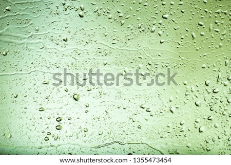 glass with rain drops