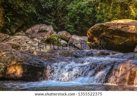 This unique photo shows the wild jungle waterfall and stunning nature also called Palau Waterfall Hua Hin in Thailand