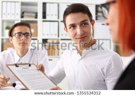 Businessman in shirt offer contract form on clipboard pad and silver pen to sign closeup. Strike a bargain for profit white collar motivation union decision corporate sale insurance agent concept
