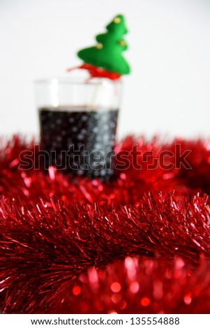 cocktail in christmas on white background with red bokeh