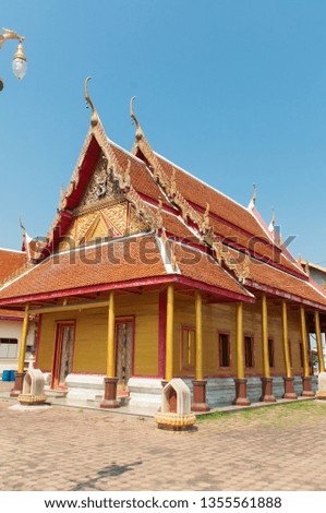 The old temple is made of golden teak, over a hundred years old in Samut Sakhon, Thailand.
