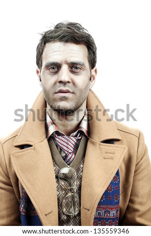 Studio portrait of a young adult man (mid 20's) wearing old-man clothes and makeup, and giving the camera a tired/exhausted/sad/depressed/numb gaze. Isolated on white background.
