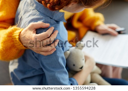Closeup of unrecognizable woman hugging teenage girl with care and love, copy space Royalty-Free Stock Photo #1355594228
