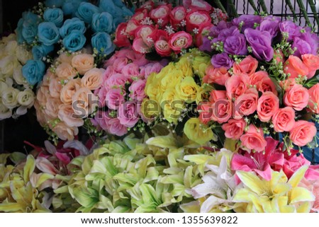 Artificial Flowers, Bouquet of roses produced from fabric and variety of colors.