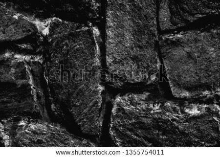Marble rock texture in black and white.