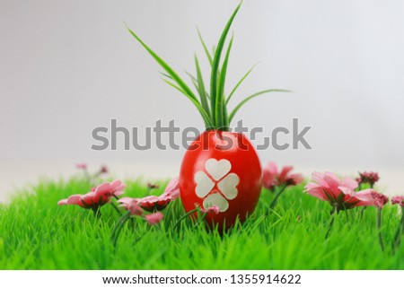 Eastern egg decor with vintage look done for planting green grass inside decorated with diy skills 