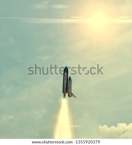 Heavy Carrier Rocket Launch into blue sky. Space mission. Elements of this image furnished by NASA.