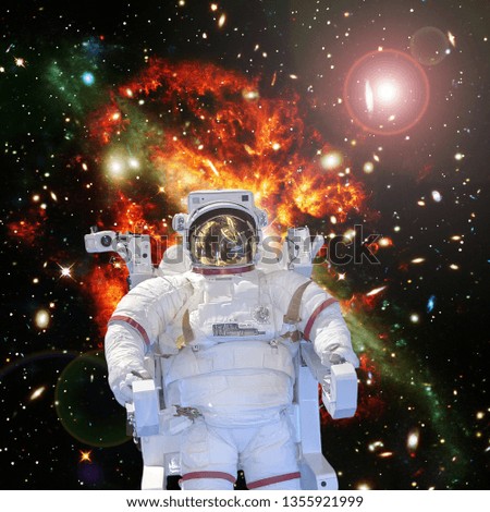Astronaut and space, galaxies and stars. The elements of this image furnished by NASA.
