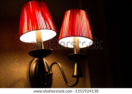 Red Wall light close-up Royalty-Free Stock Photo #1355924138