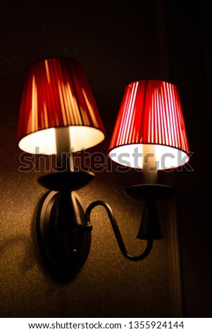 Red Wall light close-up Royalty-Free Stock Photo #1355924144