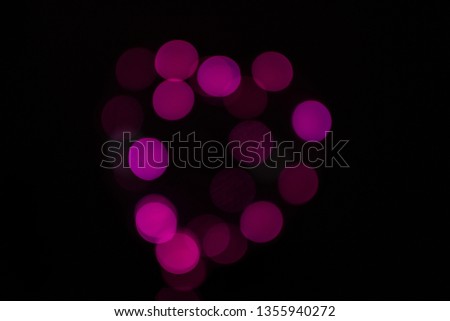 Abstract purple bokeh background.