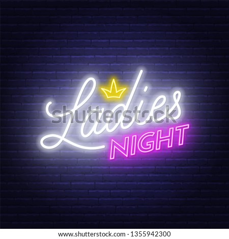 Ladies Night neon lettering on brick wall background. Royalty-Free Stock Photo #1355942300