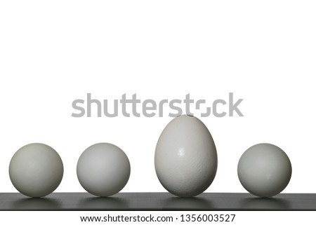 Three ping pong balls, among which is an egg. Similar does not mean the same.