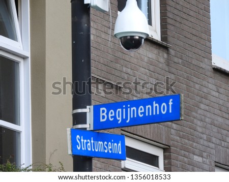 Close up streetsign crossroad Stratumseind and Begijnhof in the centre of Eindhoven, the Netherlands.
Camera surveillance, police monitoring behavior and activities. Part of a serie.