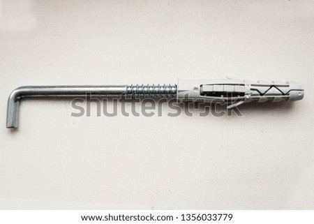 threaded coupling and plug on a white background