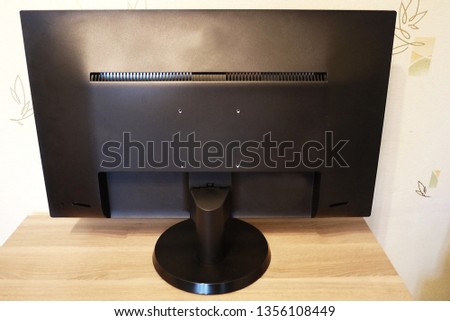 Monitor with wide screen for photo editing.
