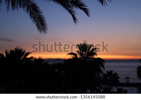 Sea view form the hotel to the beautiful sunrise on the red sea Royalty-Free Stock Photo #1356145088
