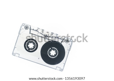 Trendy reviving retro audio cassette tape monochrome isolated on white. Analogue music hipster trend