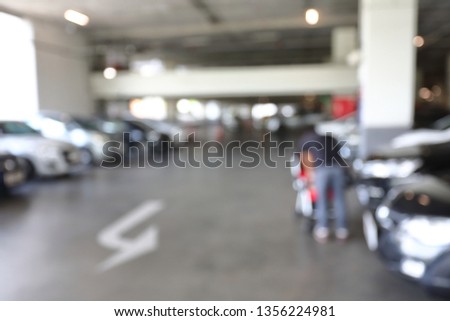 car park in business building, blur image background