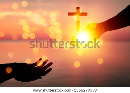 Jesus helping hand concept: World Peace Day Help hand on sunset background
    
    - Image