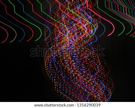 Colored lights on black background