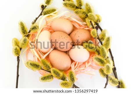 Easter eggs in a basket of willow. chicken eggs