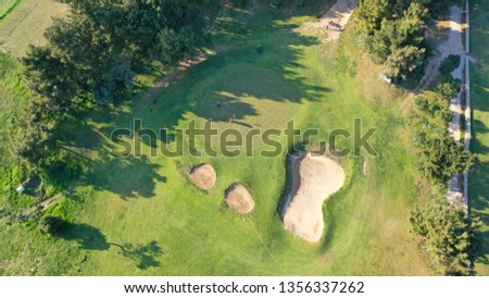 Aerial top view photo of Golf course located on popular Mediterranean destination