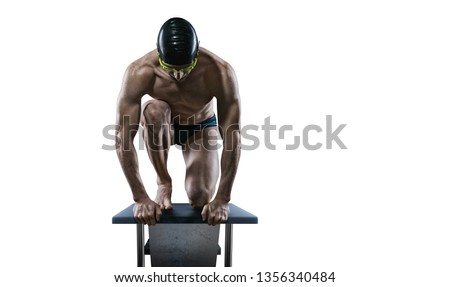 Swimming pool. Isolated muscular swimmer ready to jump.	 Royalty-Free Stock Photo #1356340484