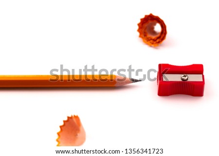 Illustration of a pencil sharpener using a sharpener on a white background.
