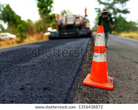 Road construction by burning asphalt road Then paved with new asphaltic concrete materials, blurred images