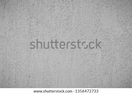 The texture of the old cement wall with scratches, cracks, dust, crevices, roughness, moss. Can be used as a poster or background for design.