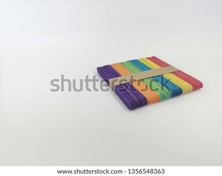 A Colorful ice cream sticks on the white background