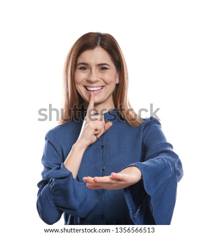 Woman showing HUSH gesture in sign language on white background