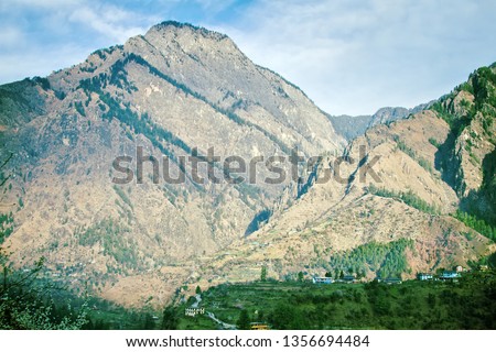 Lesser Himalayas. Mountain landscapes of spring time with peaks and ridges in the blue distance