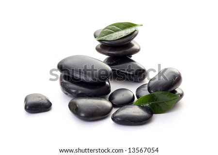 stack of pebbles isolated on white - wellbeing