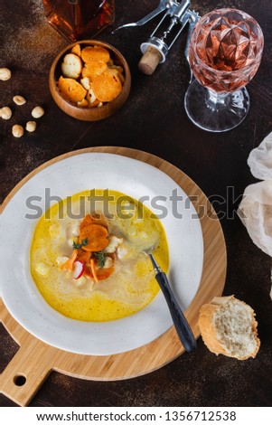 Cream pumpkin soup served with cheese and croutons– stock image