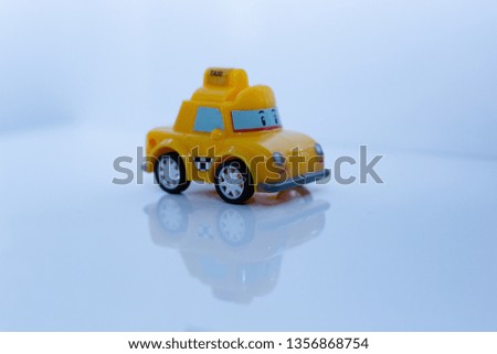 Colorful toy truck with reflection isolated on white background Royalty-Free Stock Photo #1356868754