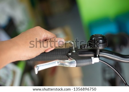 People hold Hexagon key repair Bicycle. 