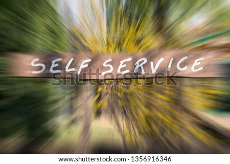 Sign with written "self service", blur background,horizontal photo.