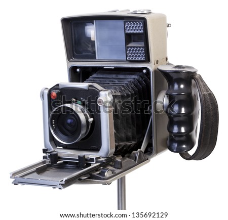 Diagonal view of an old fashioned dusty vintage camera isolated on white background. Clipping path included.