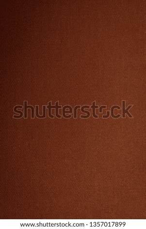 Brown-golden texture with gradient, background, abstraction. Space for text. Matte coating