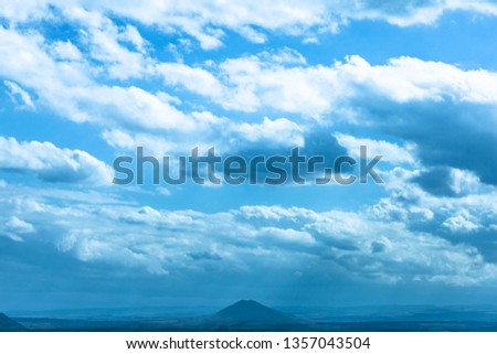 Mountain and clouds. Blue sky. Pretty view. Russia