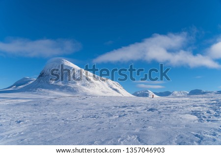 Silhouette of a lone cross country skier in national park Sarek. Lapland, Sweden.