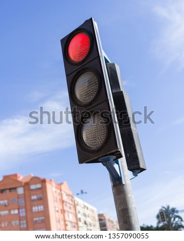 Traffic light signal for vehicles, red warning lamp sign to stop the car on the road