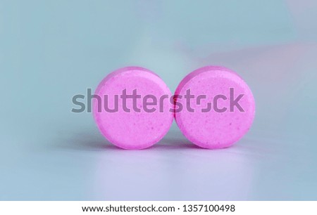 medicine concept; Pink pills with white background