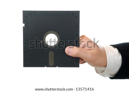 business man holding old floppy