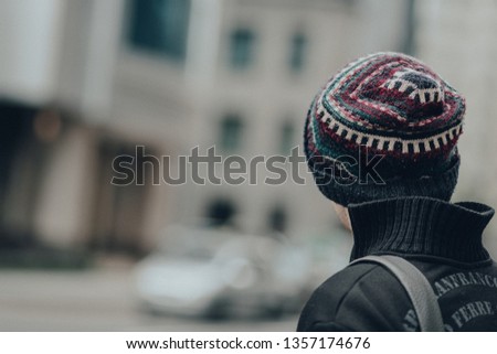 Back of the men head and shoulder waiting on the street road. Trip alone.  Royalty-Free Stock Photo #1357174676