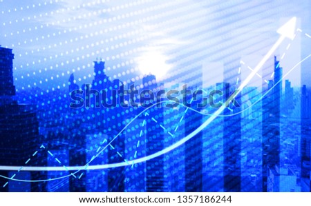 Chart direction up trend and volume on blue theme background  business building 
